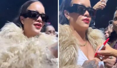 Rihanna konserde göğsünü açıp imzalattı